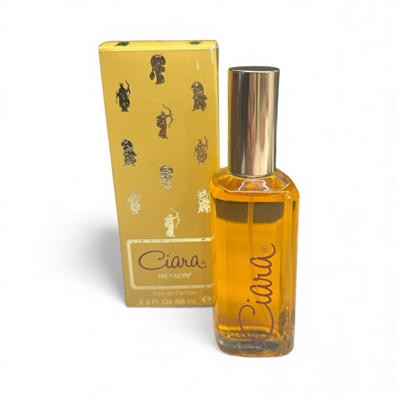 Revlon Other - Revlon Ciara Perfume with Gold Cap and Amber Hue